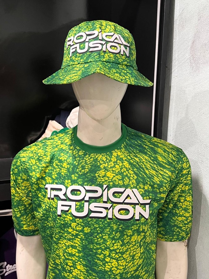 Close-up of the Tropical Fusion bucket hat and tee showing print detail