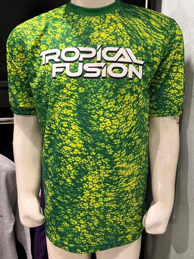 Front of the Tropical Fusion tee showing the all-over print and logo